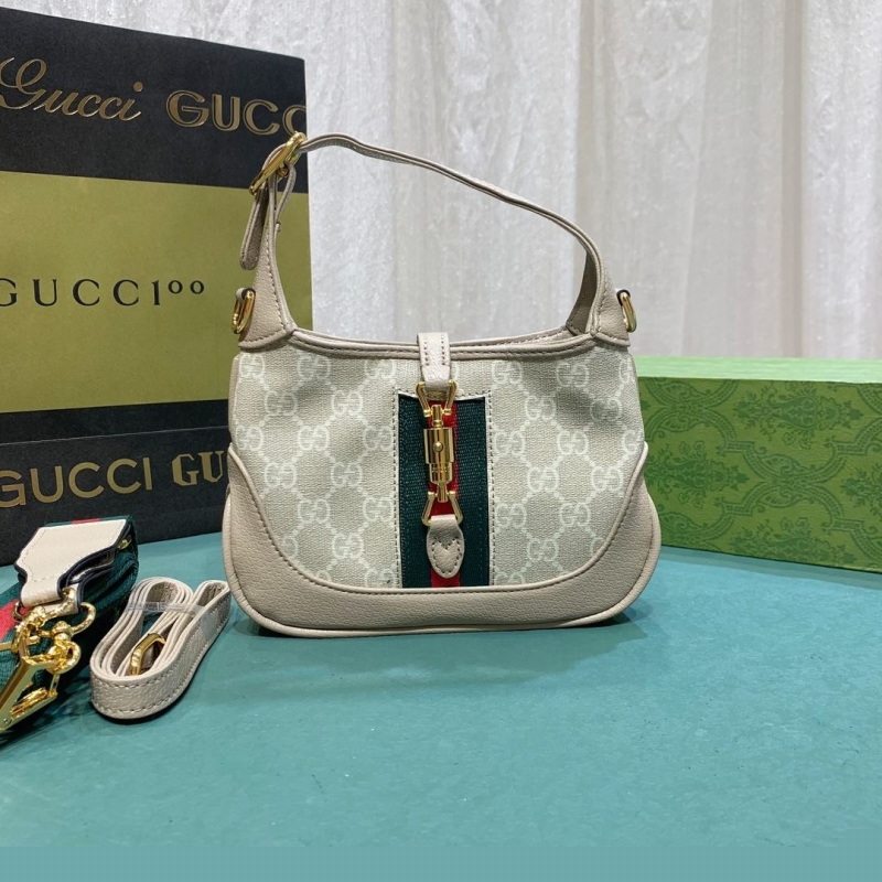 G*u*i top handle bags